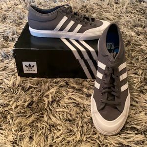 Adidas grey and white skate boarding sneakers